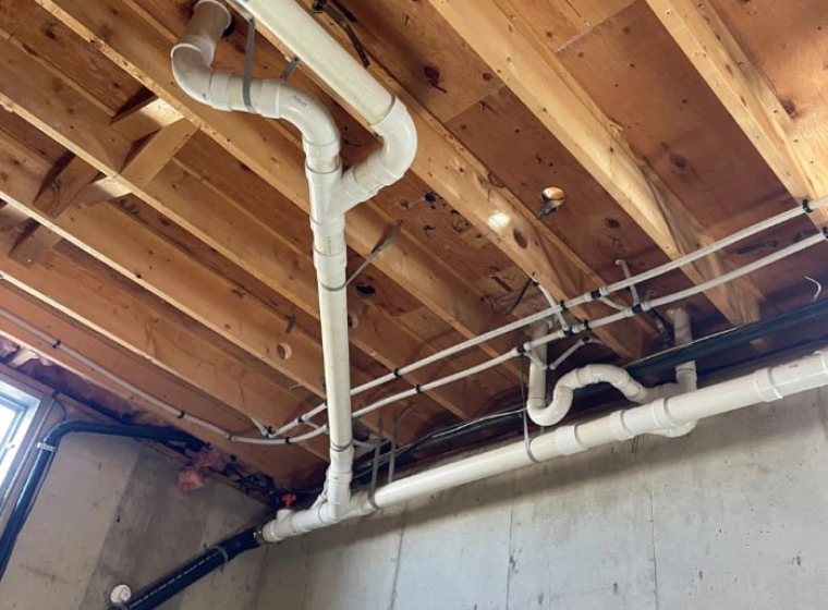 tubing system of a house in the ceiling of its basement 1